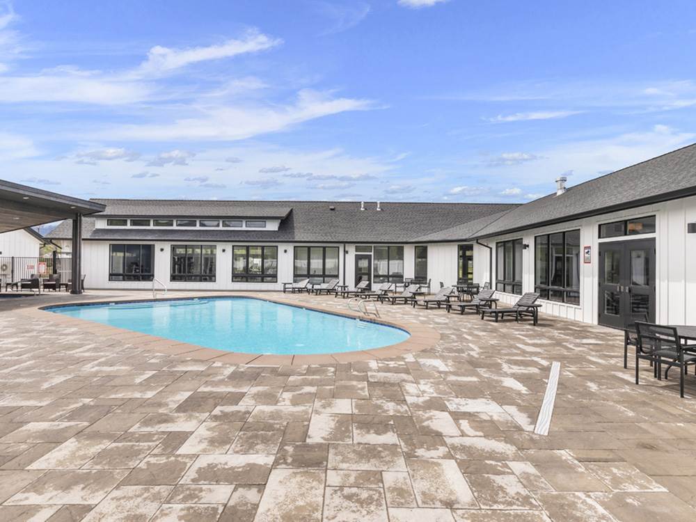 Pool area with lounge chairs