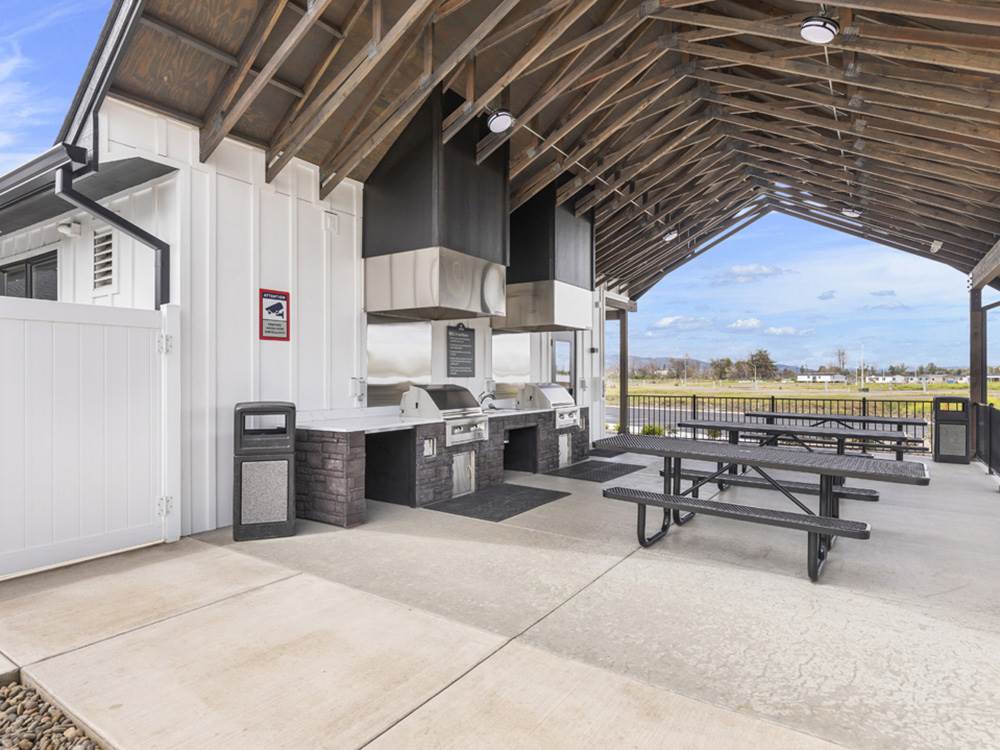 Covered outdoor grill and patio area