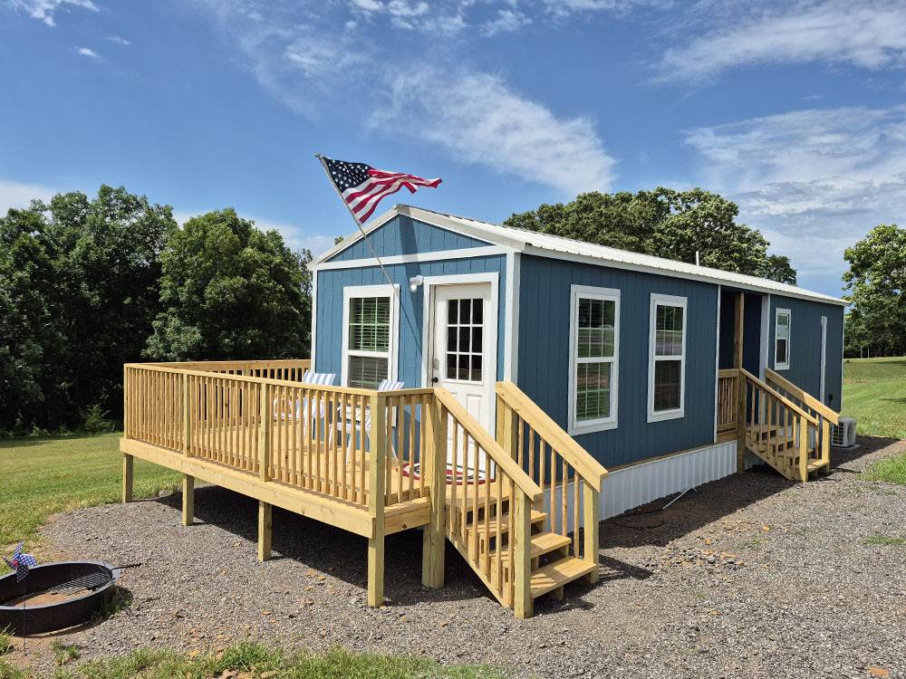 A rental with a porch and fire pit