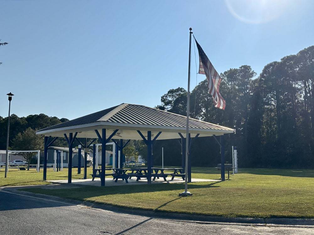 A pavilion with a picnic table