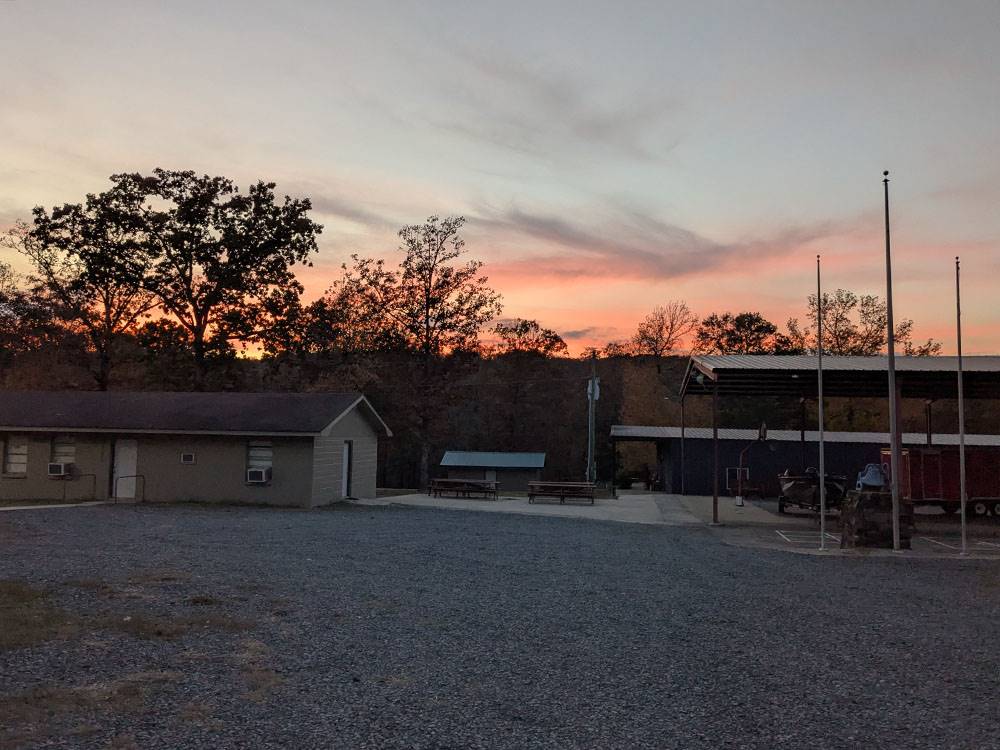 The sun setting over the park