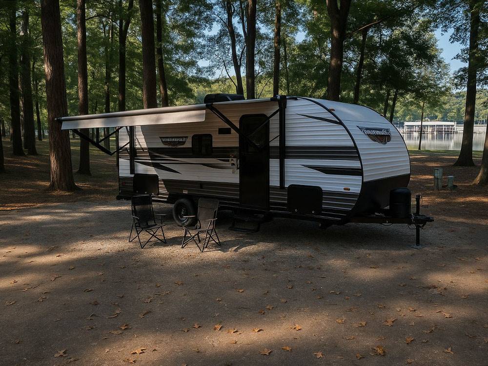 An RV in a shaded site