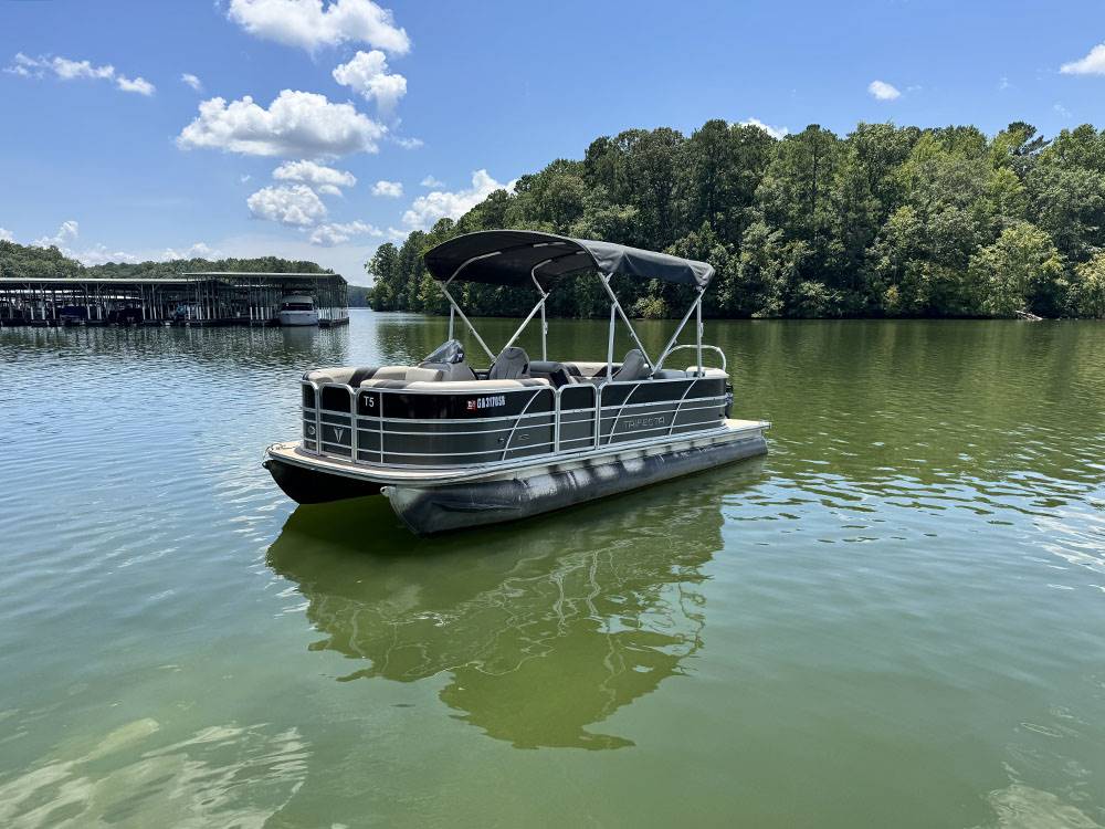 A pontoon boat on the lake