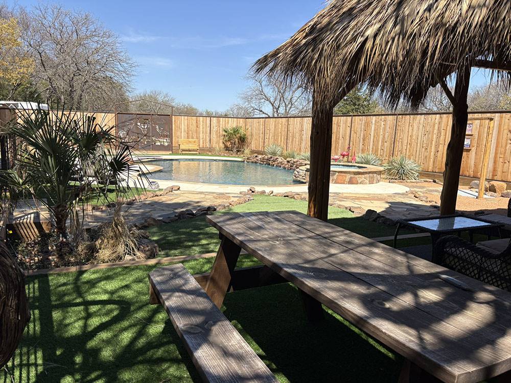 A view of the pool from a picnic table