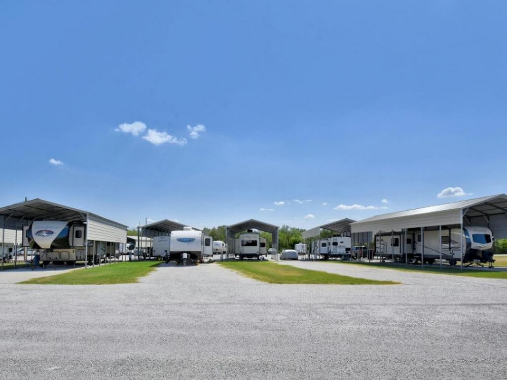 Parked covered trailers at site David's RV Park