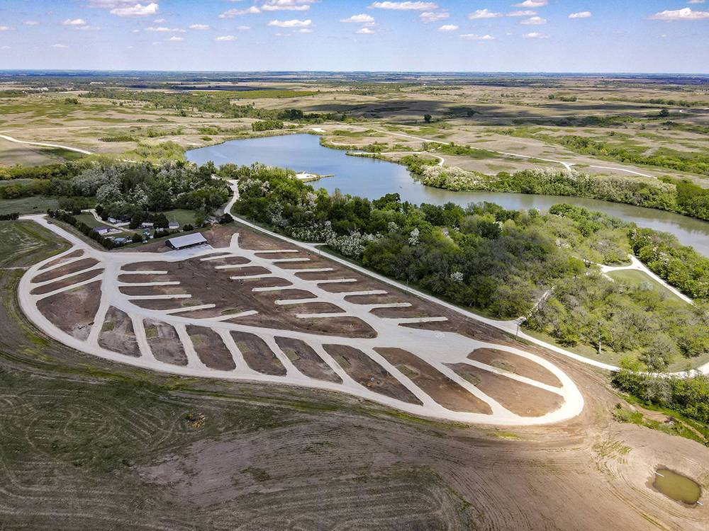 Aerial view of campgrounds, pond and surrounding area
