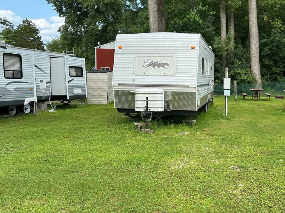 RV trailer on grassy site