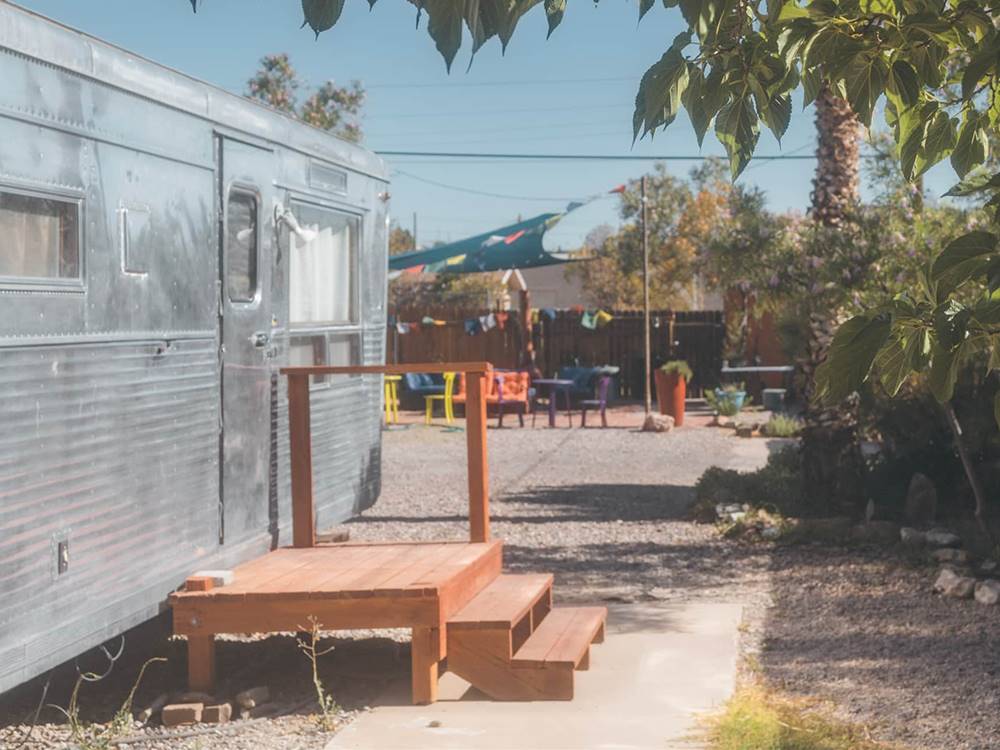 RV and table and chairs on gravel