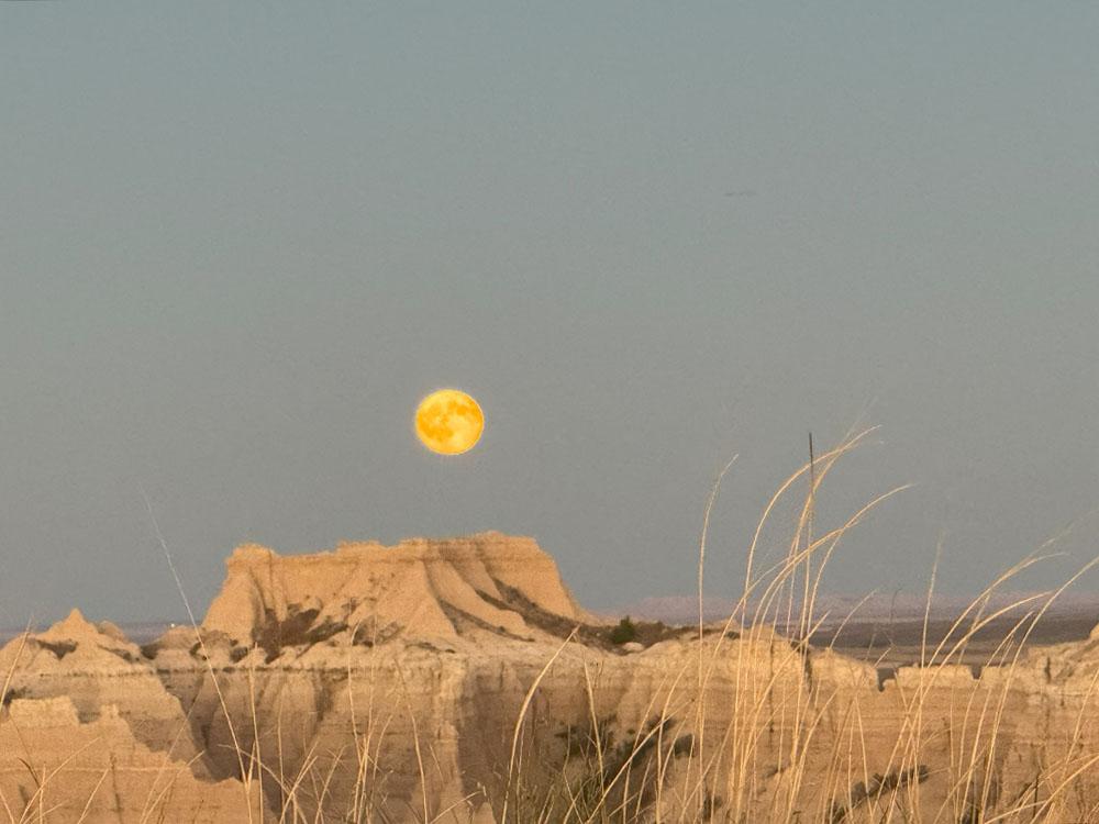 The full moon over the Badlands
