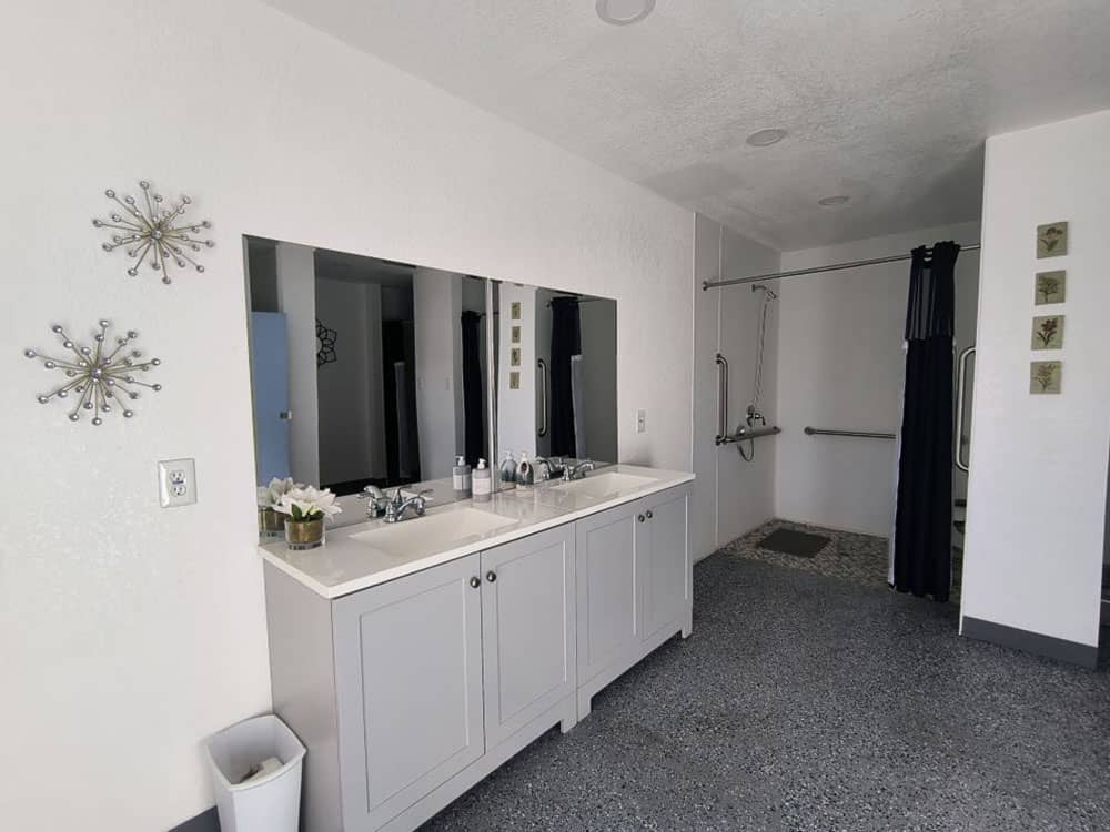 Double sinks and mirrors in the restroom