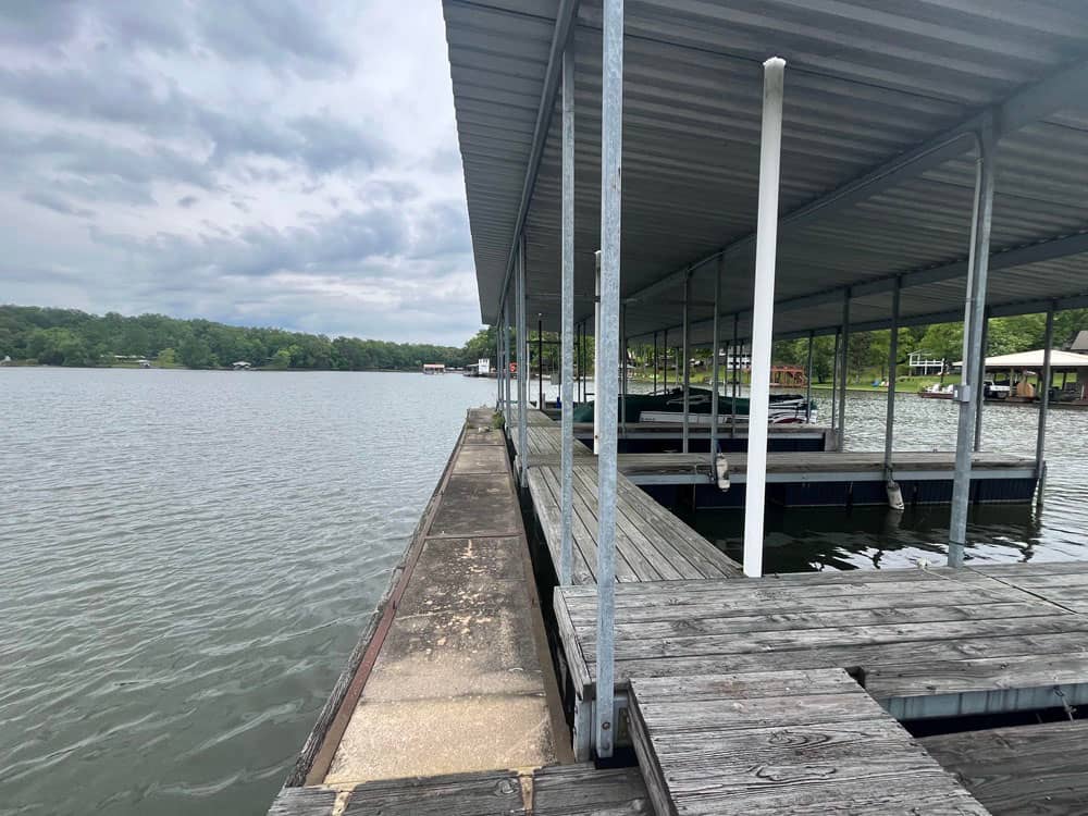 A boat in a covered slip