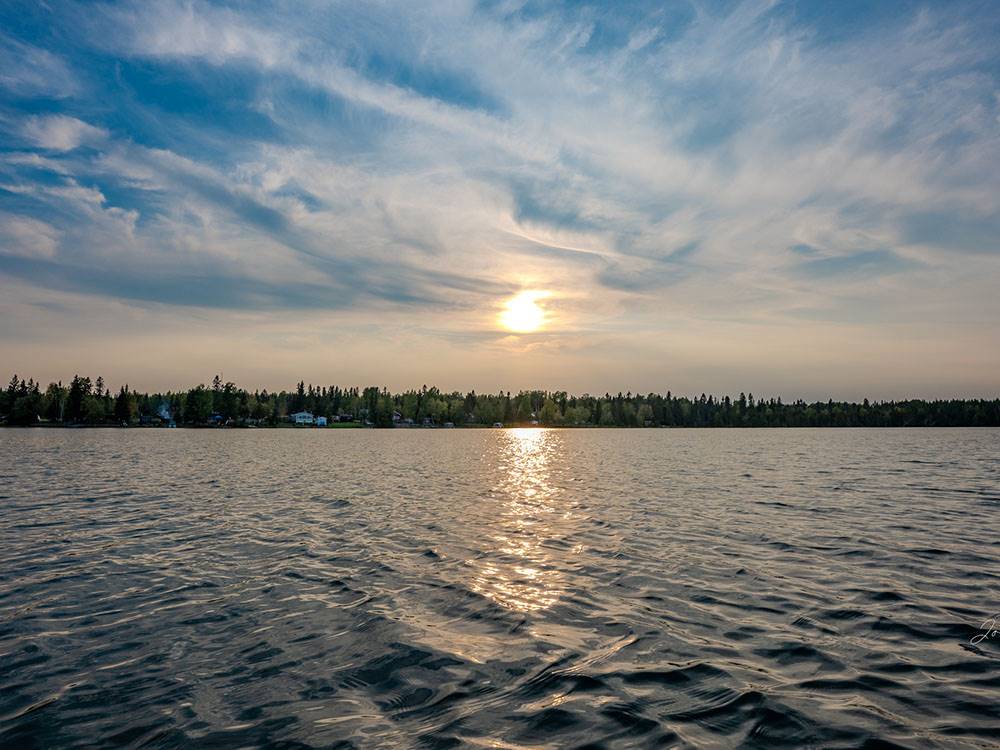 Sunset by the water