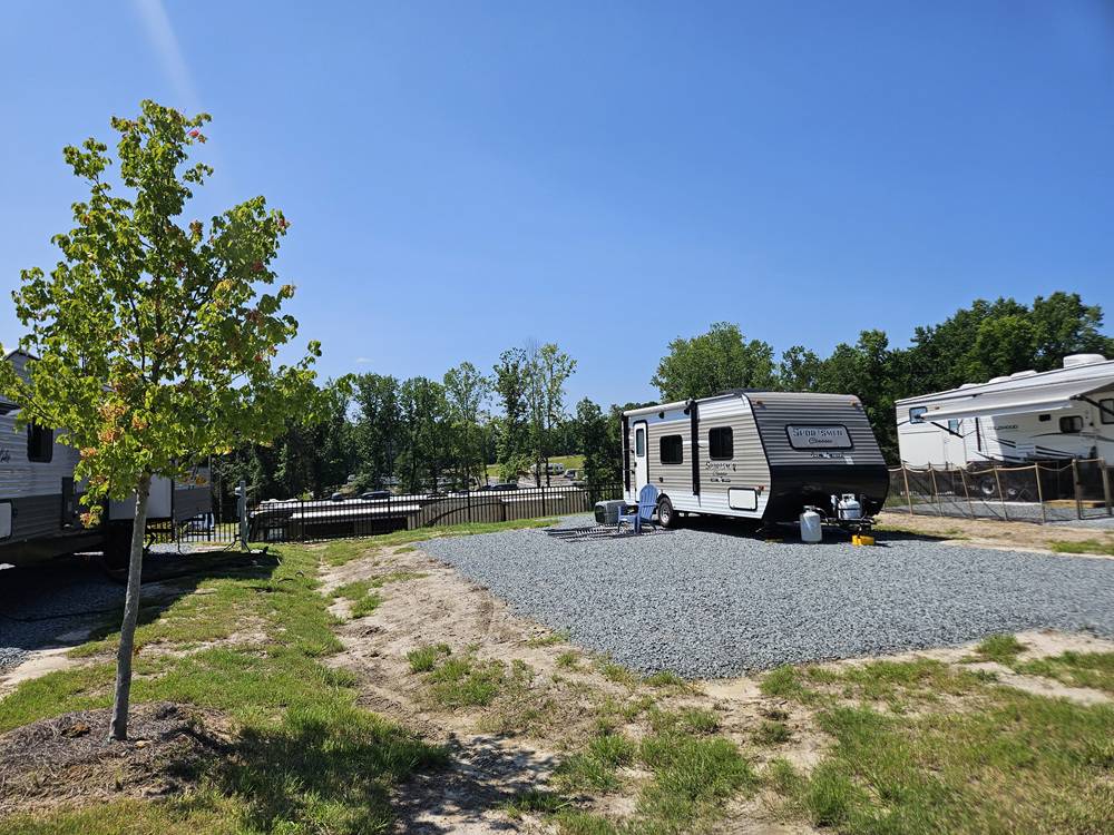 A small travel trailer at a site