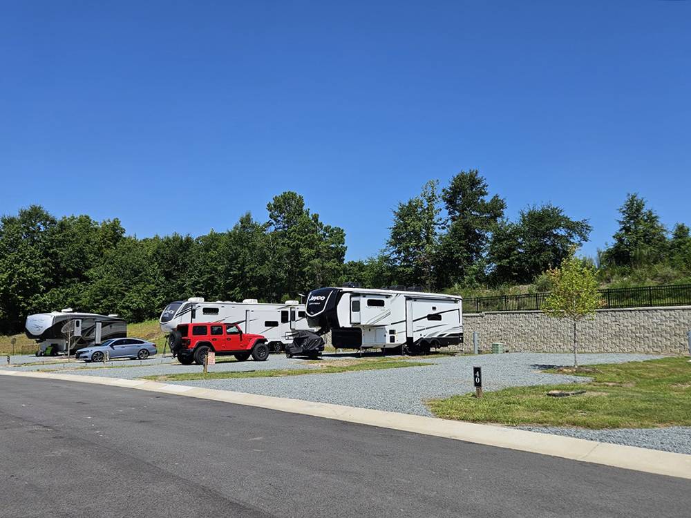 A Jeep and fifth wheel at a site