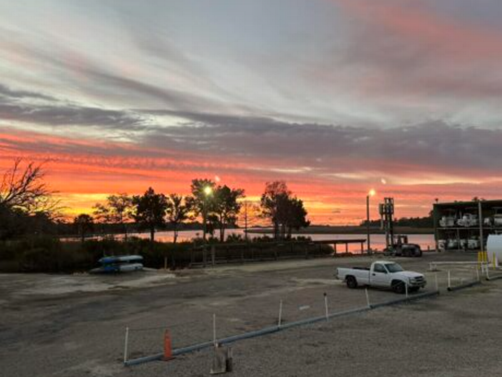 The sun sets over the water