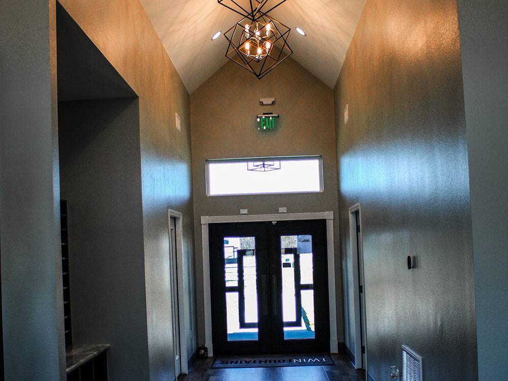 A chandelier in the hallway