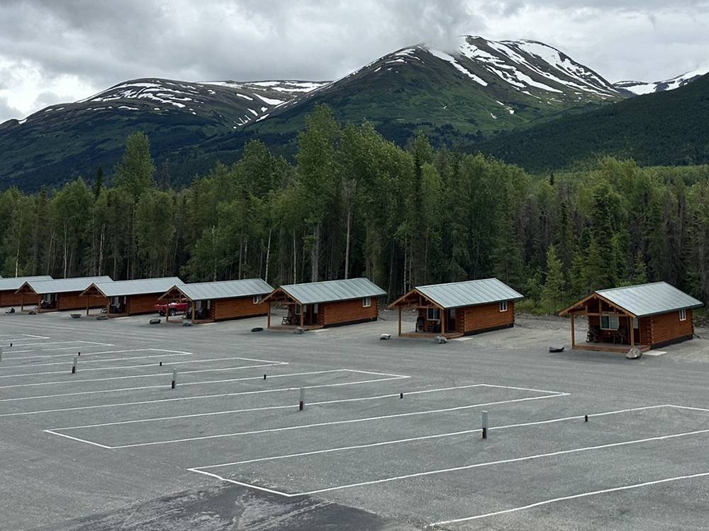 A row of rental cabins and RV sites
