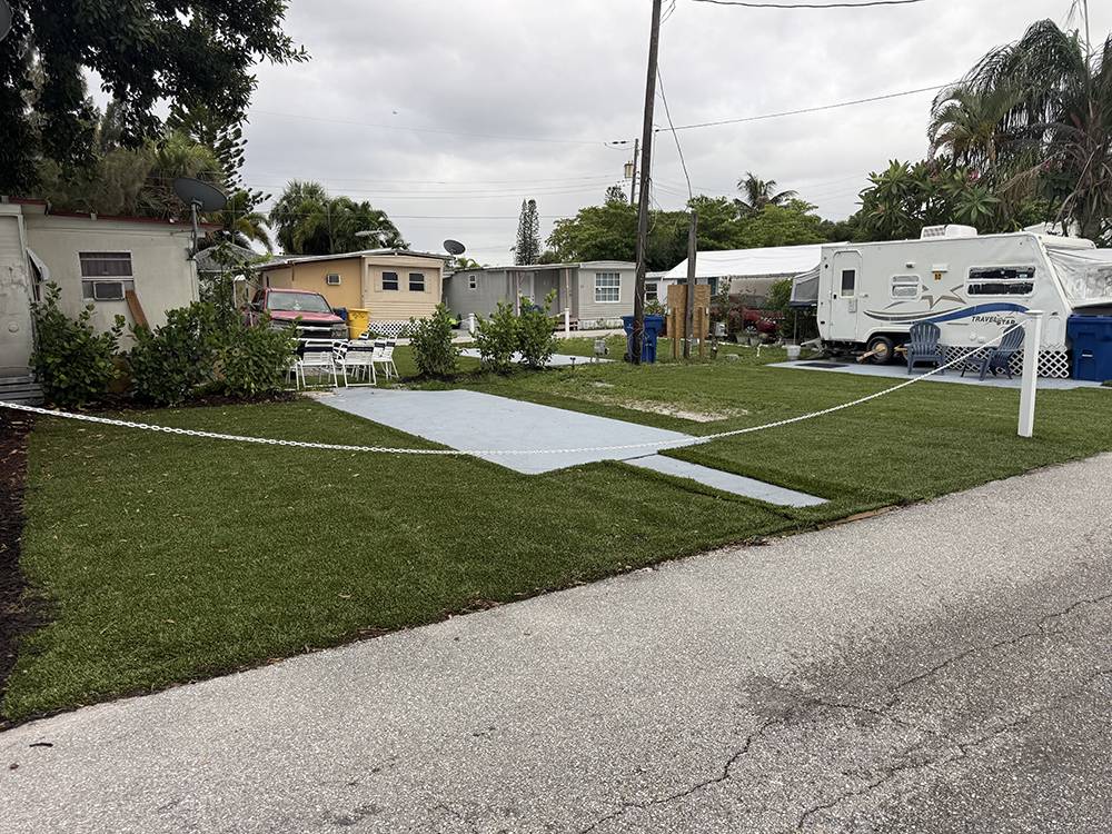 An RV parked in a paved site