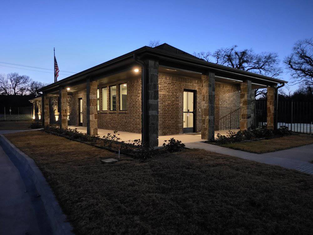 A brick building at night