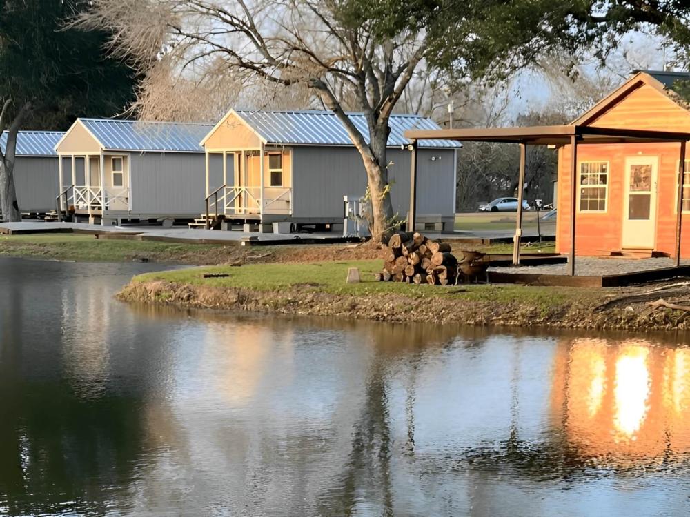 Cabins with lake view at Bon Temps RV Park