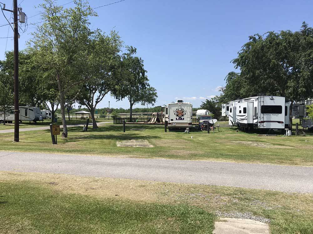 RVs parked at campsites at WEEKS ISLAND RV PARK