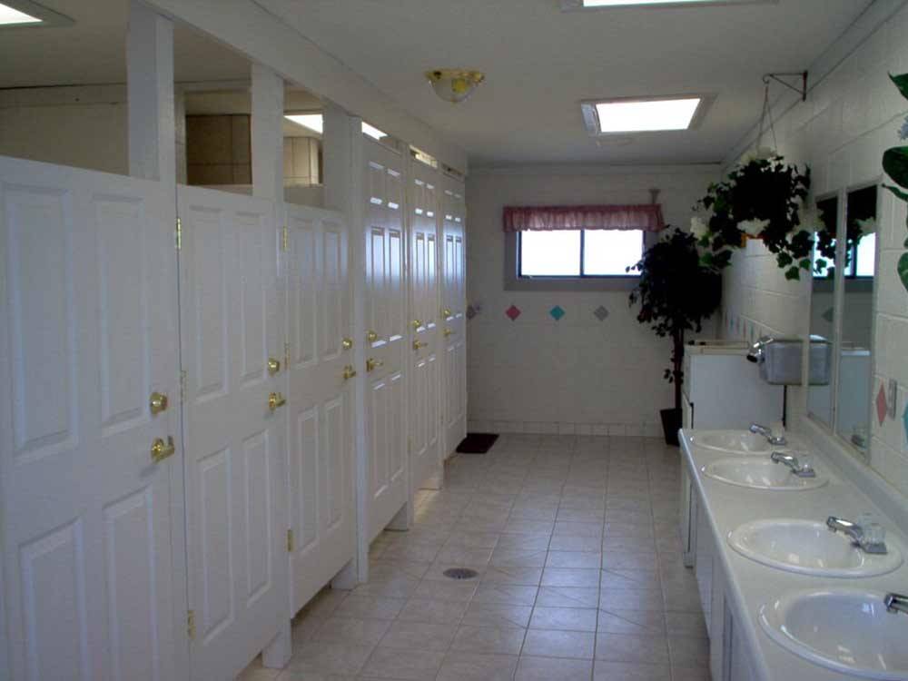 Private bathroom stalls at PINE GROVE RV PARK