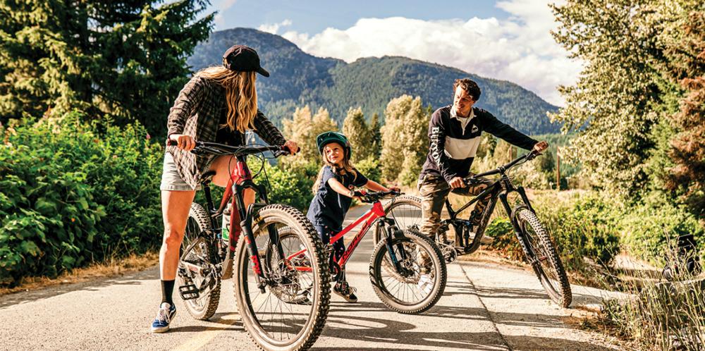 A family riding bikes