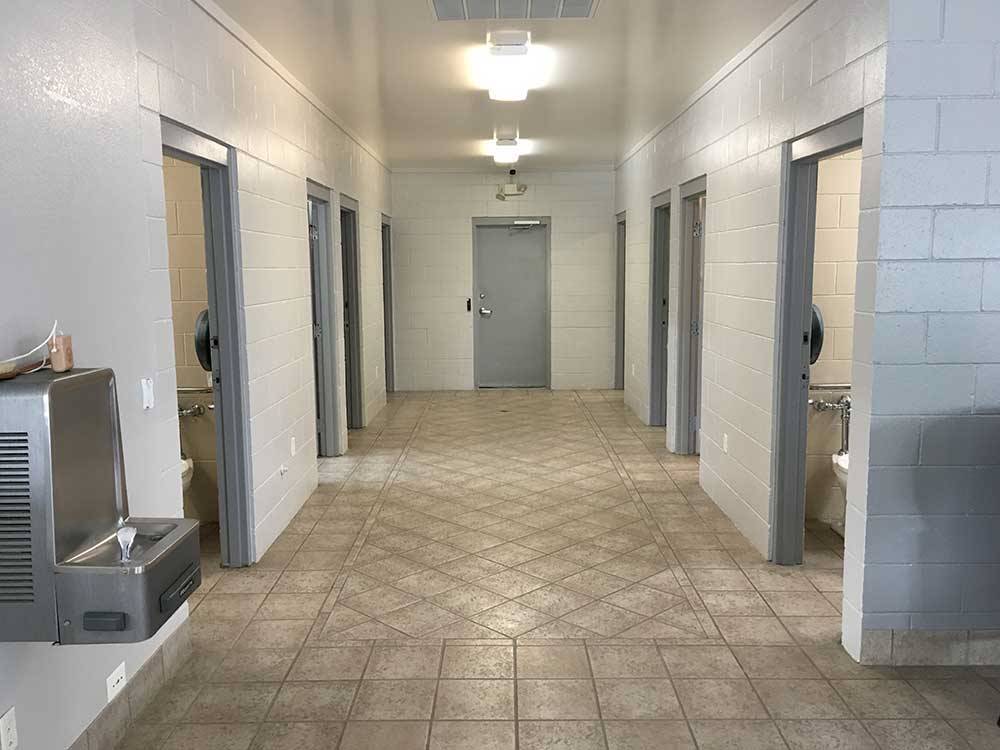 The hallway in the bathhouse at DESERT ROSE RV PARK