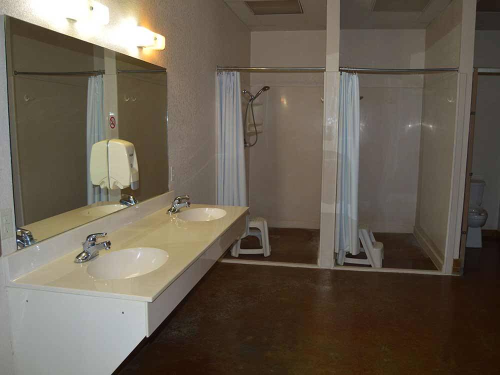 Bathroom and shower at LAZY L RV PARK