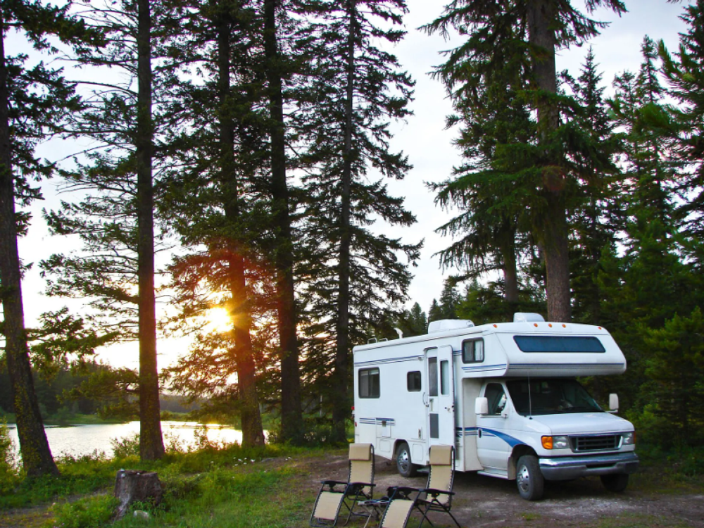 RV and chairs in a site at Indian Lake RV Resort