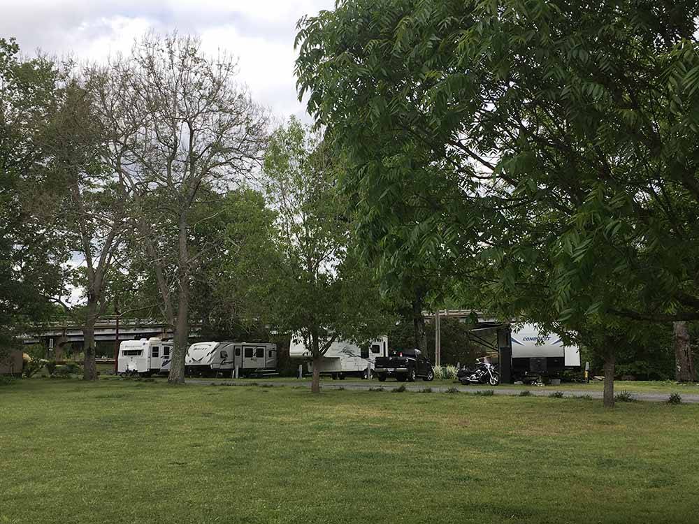 A row of trailers backed in at J & J RV PARK