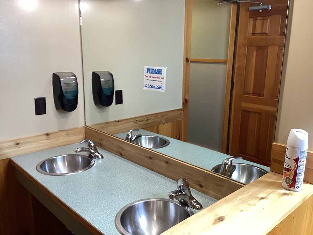 Two sinks in the bathroom at YELLOWSTONE HOLIDAY RV CAMPGROUND & MARINA