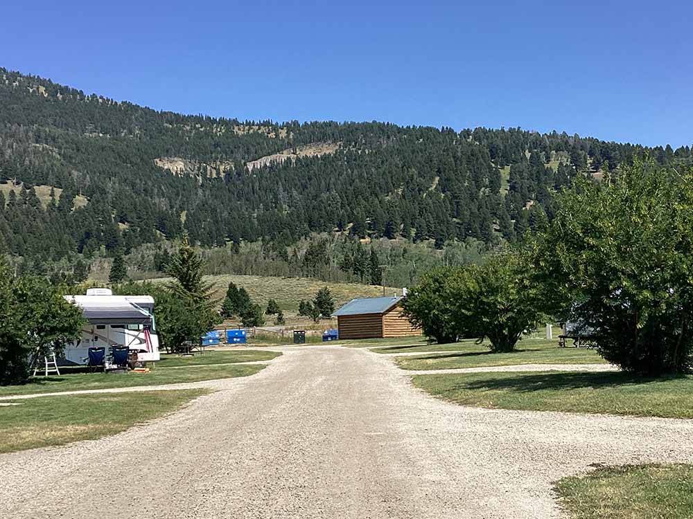 A gravel road between the RV sites at YELLOWSTONE HOLIDAY RV CAMPGROUND & MARINA