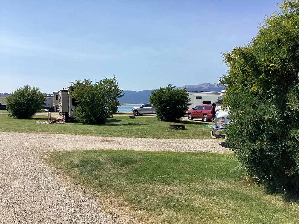An empty gravel RV site at YELLOWSTONE HOLIDAY RV CAMPGROUND & MARINA