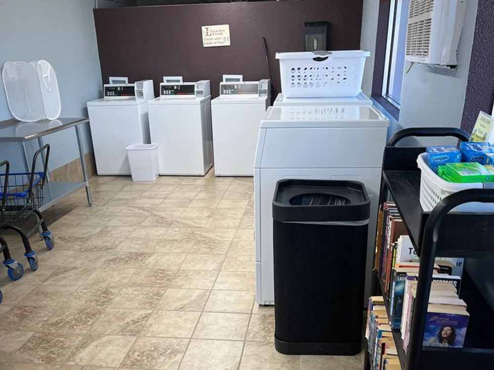 The clean laundry room at TRAVELER'S WORLD RV PARK
