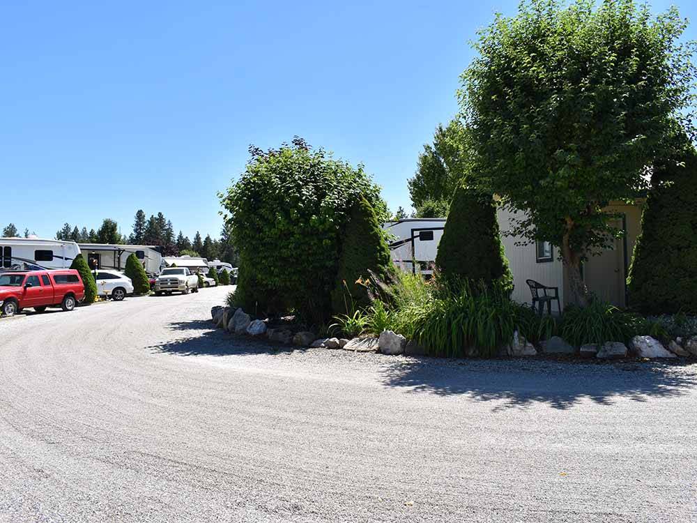 A turn in the gravel road at WILD ROSE RV PARK