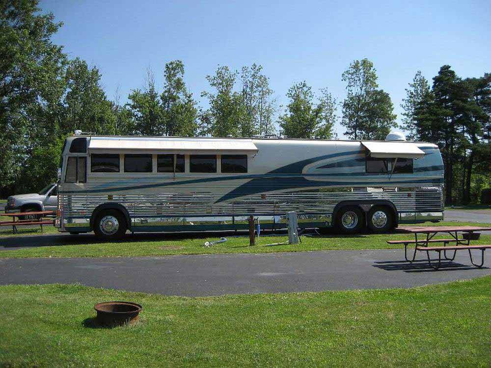 RV parked at campsite at AA ROYAL MOTEL & CAMPGROUND