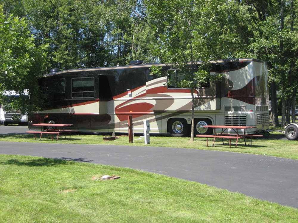 Class A motorhome parked in a RV site at AA ROYAL MOTEL & CAMPGROUND