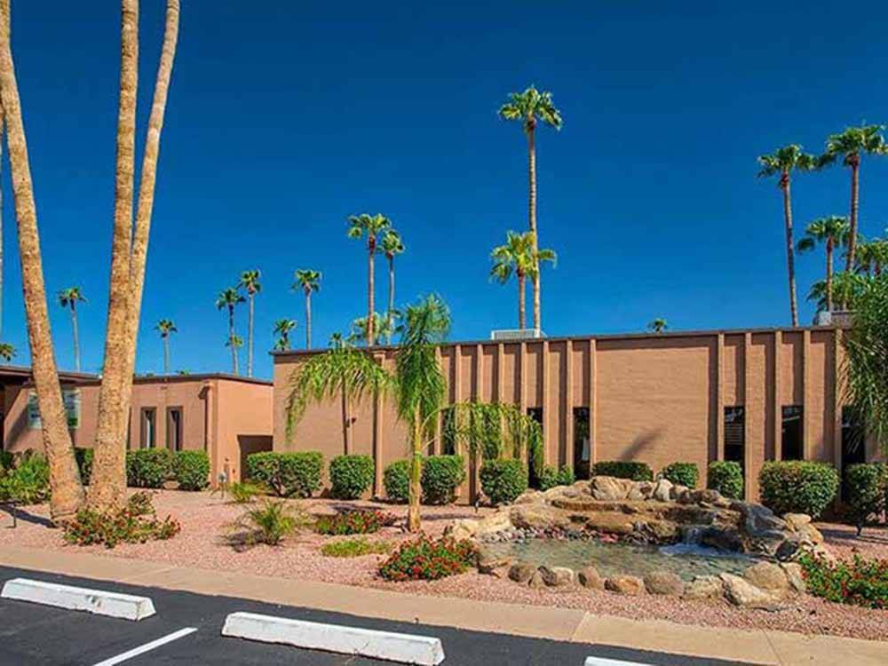 One of the main buildings surrounded by palm trees at DESERTSCAPE