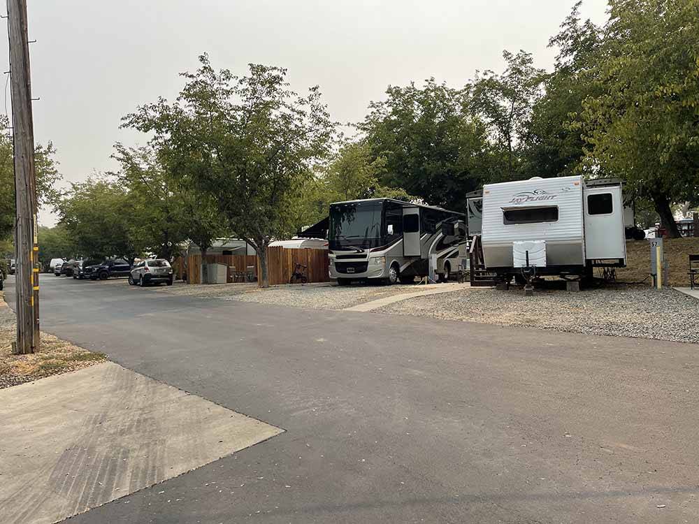 A row of back in RV sites at AUBURN GOLD COUNTRY RV PARK
