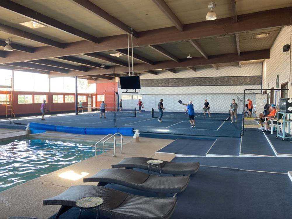 Indoor pool and pickleball courts at DE ANZA RV RESORT
