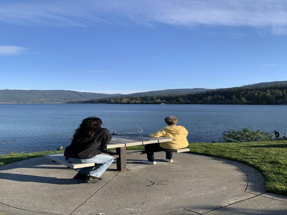 Two people enjoying the bay view
