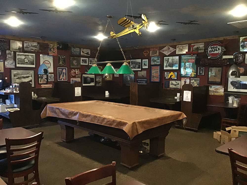Pool table and dining for guests at ROBERT NEWLON RV PARK