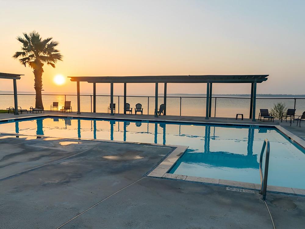 Swimming pull area at sunset