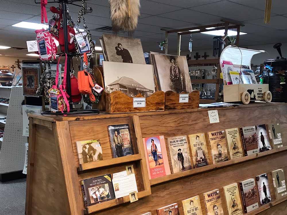 Books on shelves in the store at BILLY THE KID MUSEUM