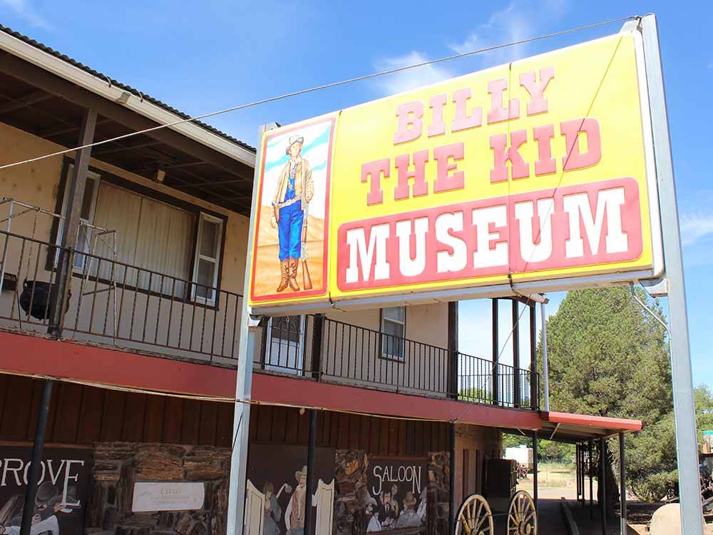 A close up of the billboard sign at BILLY THE KID MUSEUM