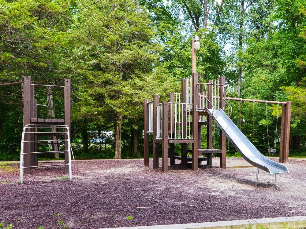 Playground with swing set at THOUSAND TRAILS RONDOUT VALLEY
