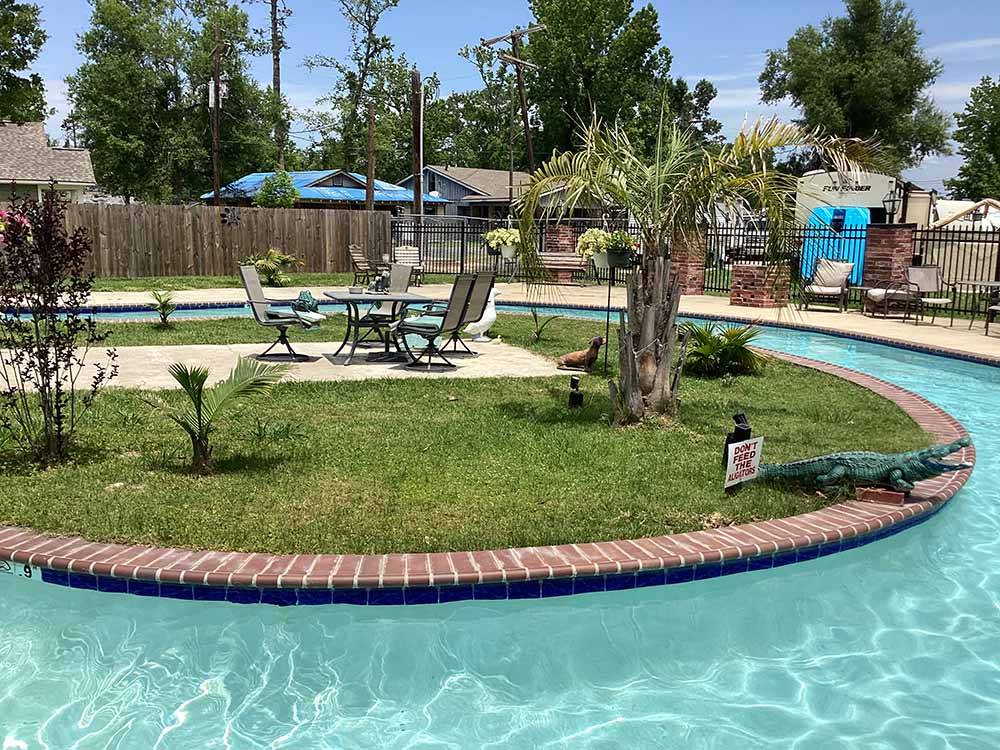 A view of the lazy river at TWELVE OAKS RV PARK