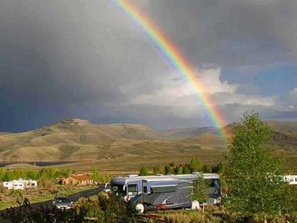 A rainbow over the RV sites at THOUSAND TRAILS BLUE MESA RECREATIONAL RANCH