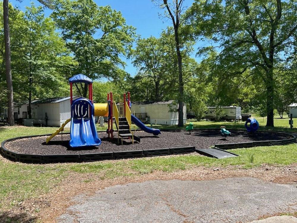 The children's playground area at CARSON VILLAGE MOBILE HOME & RV PARK